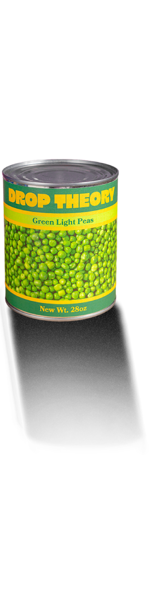 A can of Drop Theory “Green Light Peas” labeled 28 oz displayed against a pink tiled background.